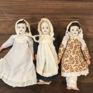3 little girls with porcelain heads